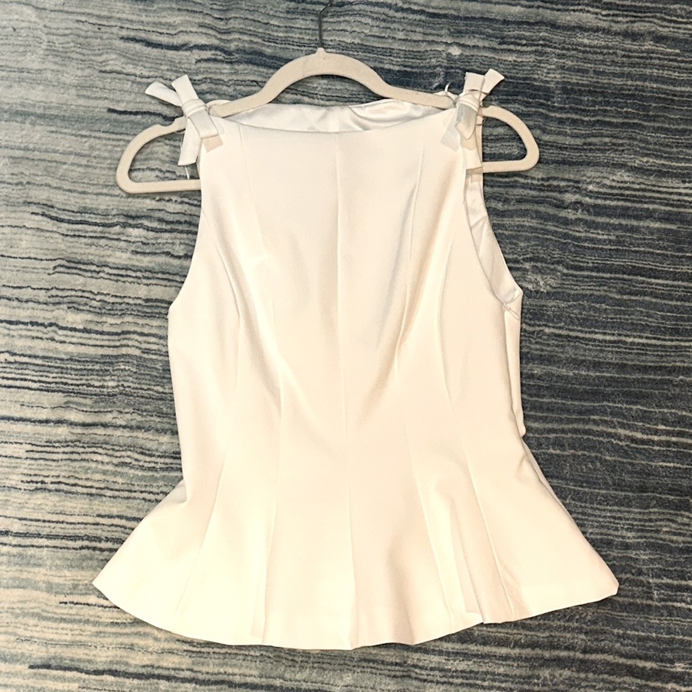 Zara Peplum White Sleeveless Blouse with Bow Details
